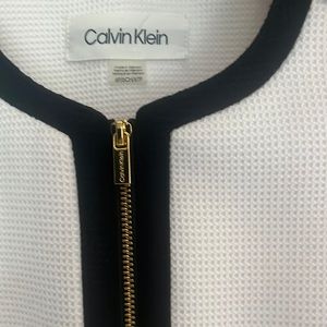 White suit jacket with black trim and gold accents. (Matching skirt nwt avail)